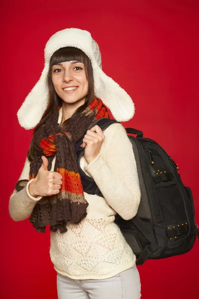 Winter woman tourist with backpack — Stock Photo, Image