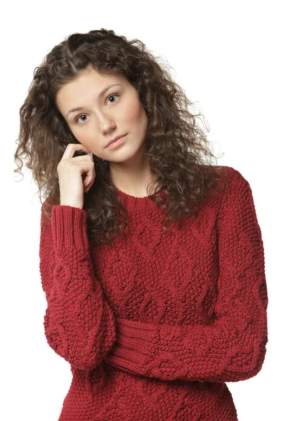 Pensive female in sweater with folded hands — Stock Photo, Image