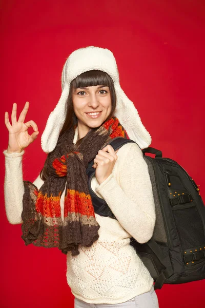 Winter woman tourist with backpack — Stock Photo, Image