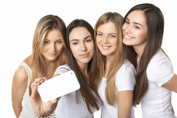 Chicas haciendo autorretrato con un teléfono inteligente — Foto de Stock