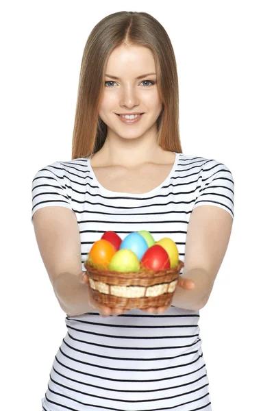 Female holding basket with Easter eggs — Stock Photo, Image