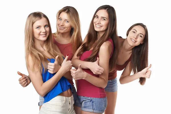 Happy group of friends gesturing thumbs up — Stock Photo, Image