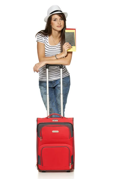 Female in casual standing with travel suitcase — Stock Photo, Image