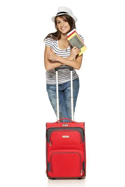 Female in casual standing with travel suitcase — Stock Photo, Image