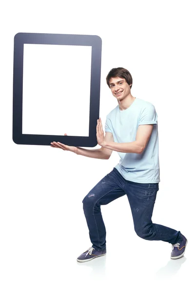 Full length man carrying tablet frame — Stock Photo, Image