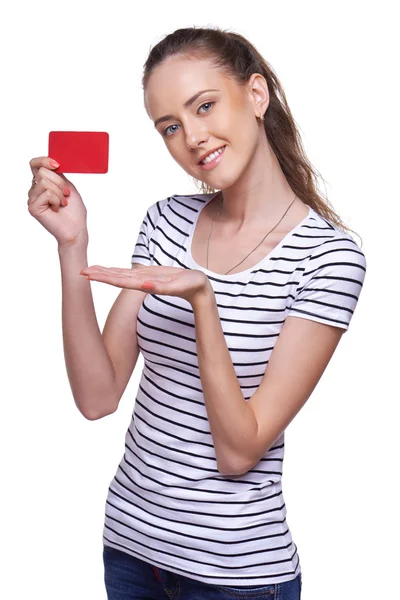 Happy smiling female showing blank credit card — Stock Photo, Image