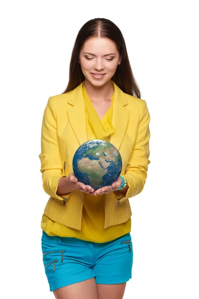 Happy smiling woman holding small earth globe on her palm —  Fotos de Stock