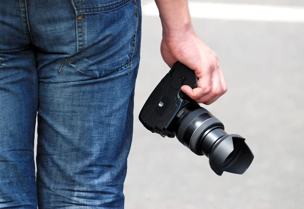 Camera in hand — Stock Photo, Image
