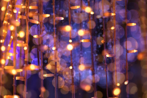 クリスマスの花綱ぼやけて背景ライト — ストック写真
