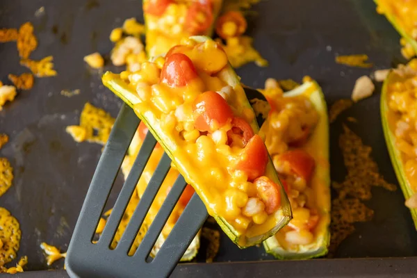 mediterranean food stuff zucchini with corn beans and cherry tomatoes with cheder cheese 