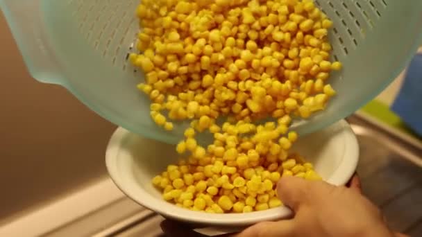 Draining Canned Corn Eat — Stock Video