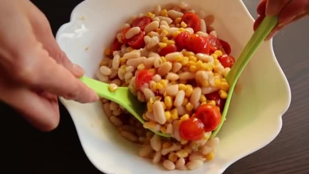 Cooking Preparing Mediterranean Salad Beans Corn Cherry Tomatoes — Stock video