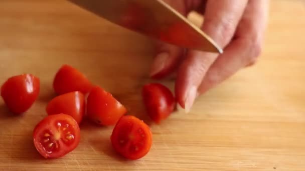 Cutting Cherry Tomatoes Home Wooden Board — Stockvideo