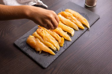 raw chicken fille close up on the kitchen table