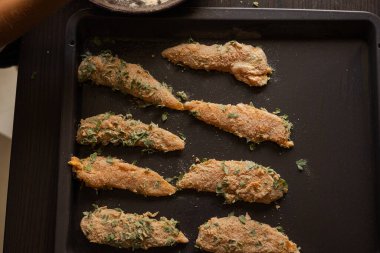 raw breaded chicken preparing close up