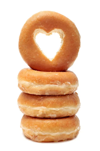 Donuts with a heart shaped hole — Stock Photo, Image