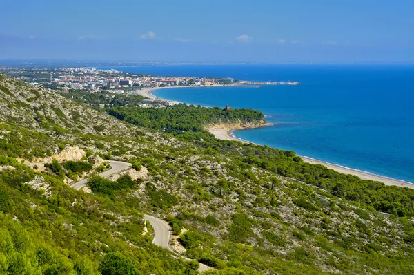 Trasiga stranden och kusten i hospitalet del barnet, Spanien — Stockfoto