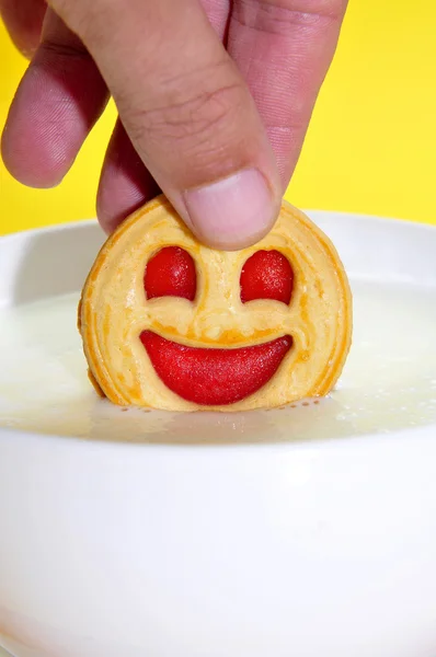 Smiley face biscuit — Stock Photo, Image