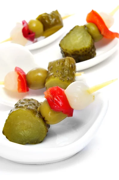 Spanish banderillas, skewers with pickles — Stock Photo, Image