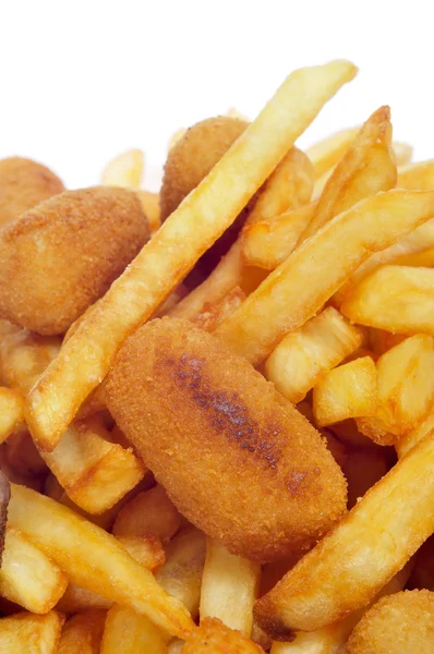 Piatto combinato spagnolo con crocchette, calamaretti e patatine fritte — Foto Stock