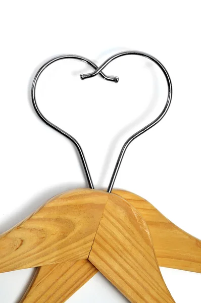 Dois cabides de roupas formando um coração — Fotografia de Stock