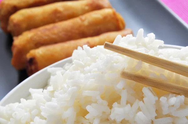 Rice and spring rolls — Stock Photo, Image