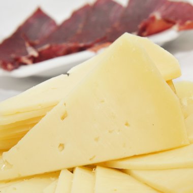 spanish serrano ham and manchego cheese tapas clipart