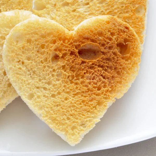 Heart-shaped toasts — Stock Photo, Image