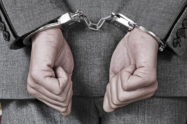 Handcuffed man — Stock Photo, Image