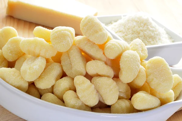 Gnocchi and parmesan cheese — Stock Photo, Image