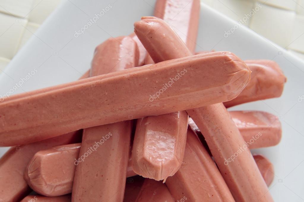 Raw hot dogs Stock Photo by ©nito103 31825255