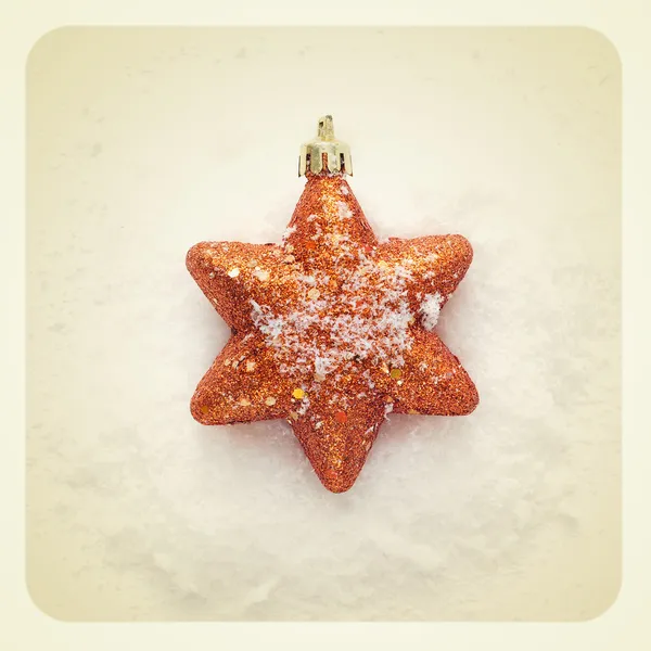 Estrella de Navidad en la nieve Imágenes de stock libres de derechos