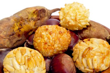 panellets and roasted chestnuts and sweet potatoes, typical snac clipart