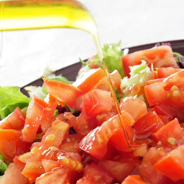 Salad with olive oil — Stock Photo, Image