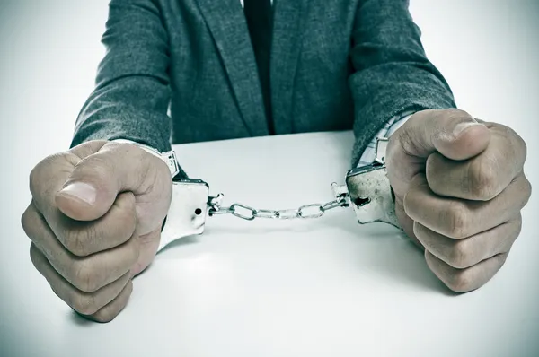 Handcuffed man — Stock Photo, Image