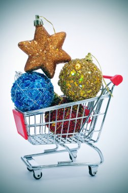 christmas ornaments in a shopping cart clipart