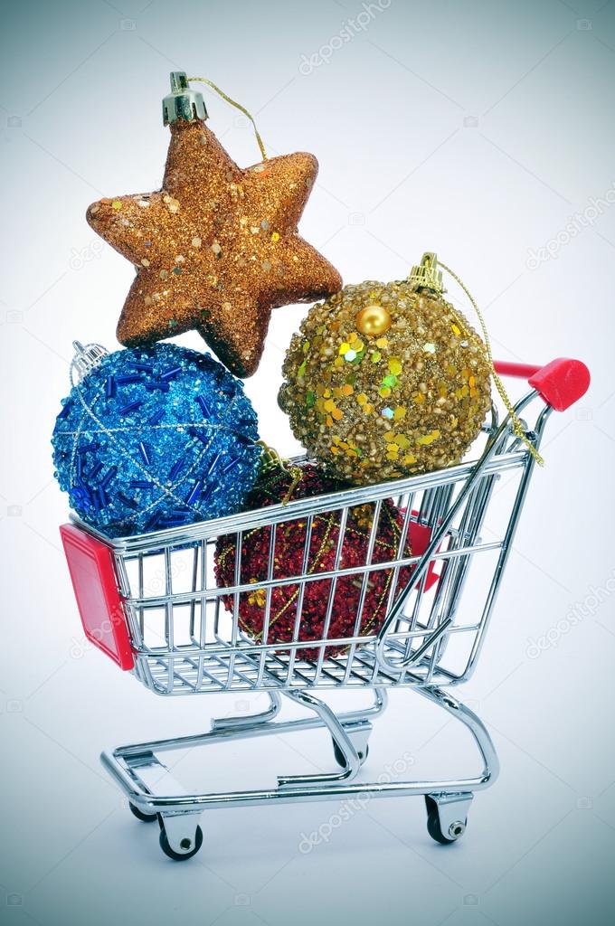 christmas ornaments in a shopping cart