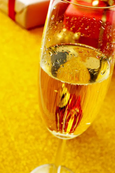 Champagne and gifts — Stock Photo, Image