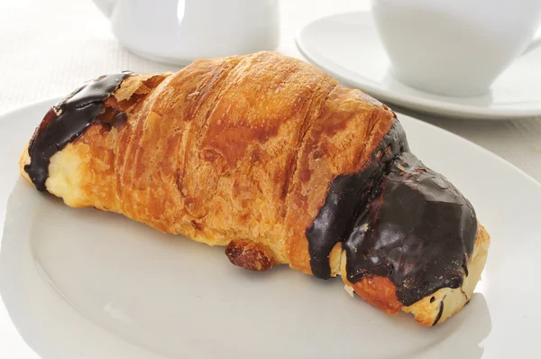 Coffee and chocolate croissant — Stock Photo, Image