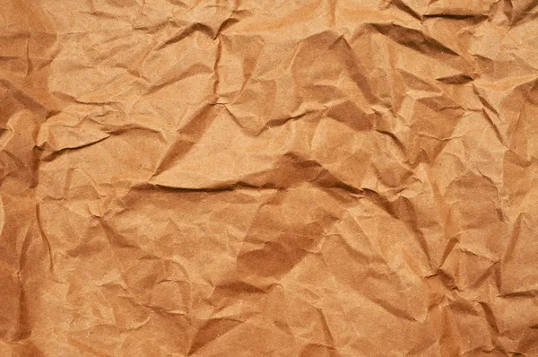 Crumpled brown paper background — Stock Photo, Image