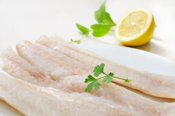 Filetes de abadejo crudos —  Fotos de Stock