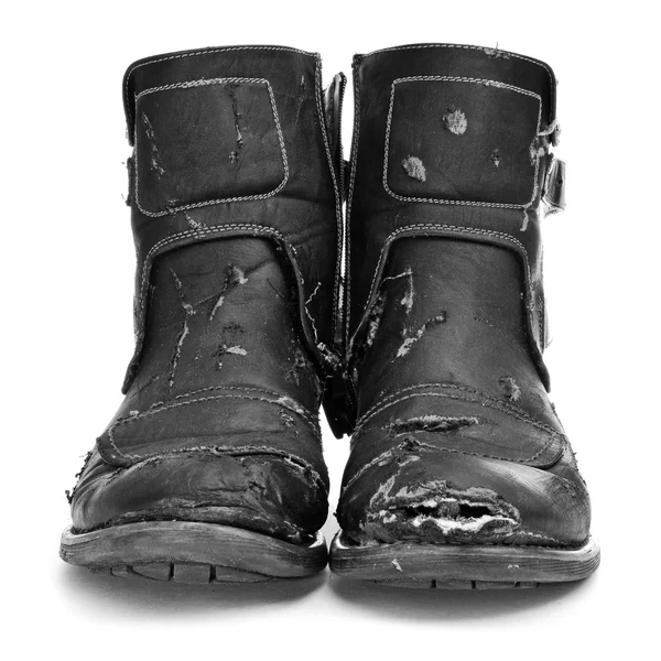 Versleten en gescheurde laarzen — Stockfoto