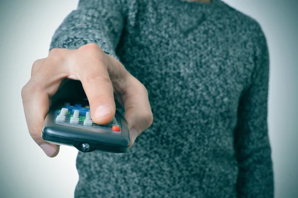 Man using a remote control — Stock Photo, Image