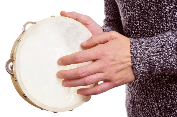 Man playing a tambourine Stock Photo