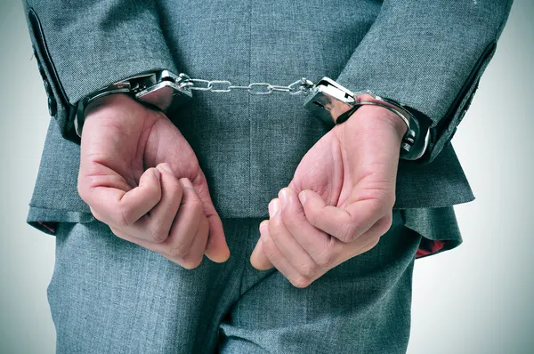 Handcuffed man — Stock Photo, Image