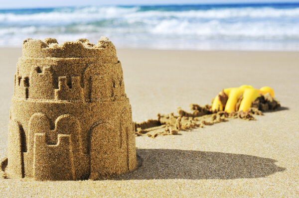 sandcastle on the sand of a beach