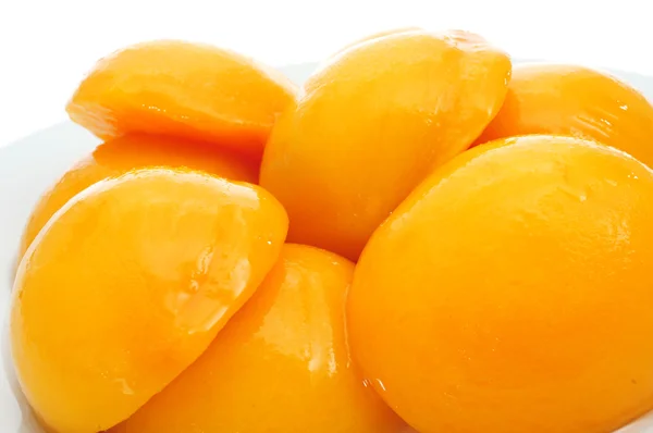 Персики в сиропе — стоковое фото