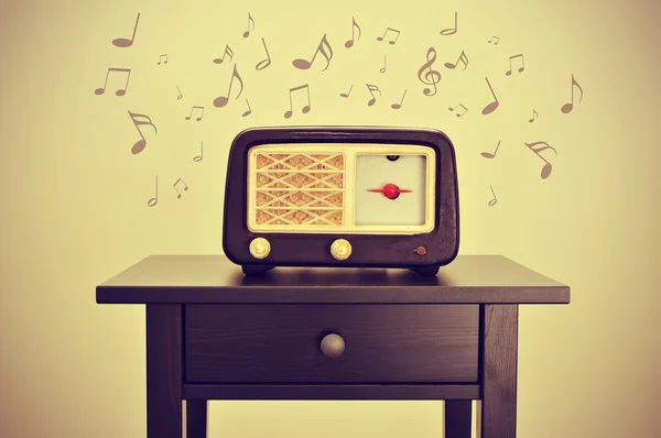 Antique radio and musical notes — Stock Photo, Image