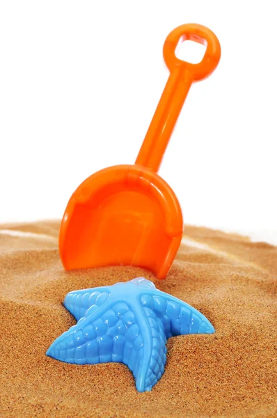 Toy shovel and sand mould — Stock Photo, Image