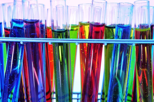 Test tubes with liquids of different colors — Stock Photo, Image